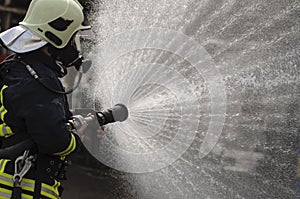 Drenched Firefighter photo