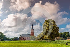 Drenthe landscape with Gothic Jacobus church and bell tower built in the 15th century