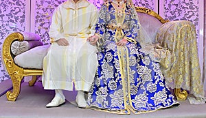 Dress the bride and groom in the wedding. Caftan Moroccan and Jellaba