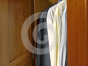 Dress shirts in the closet - door closet photo