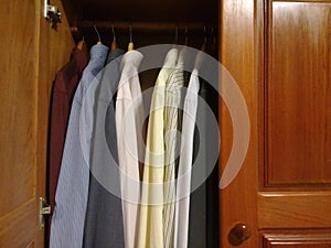 Dress shirts in the closet photo