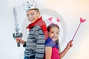 Dress up, playing and portrait of children in costume for sibling bonding, relax and fun together. Family, happy and