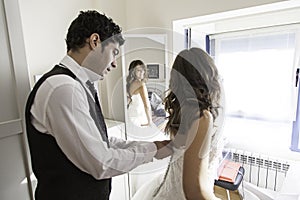 Dressing groom bridal