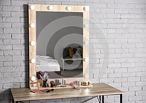 Dressing room interior with stylish mirror and set