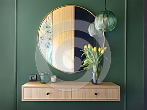 Dressing table with elegant round mirror. Home staging photo