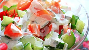 Dressing vegetable salad with sour cream and a