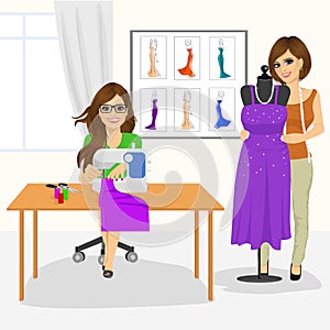 Dressmaker woman using sewing machine and fashion designer draping a mannequin with a gown