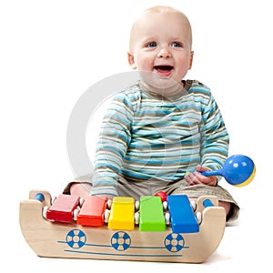 Dribbling Baby Boy Playing with Xylophone