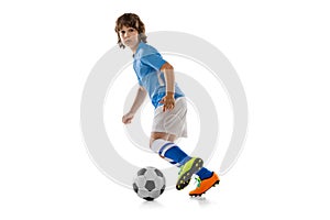 Portrait of preschool boy, football soccer player in action, motion training isolated on white studio background