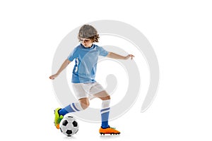 Portrait of preschool boy, football soccer player in action, motion training isolated on white studio background