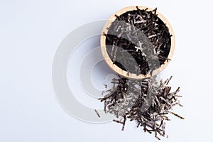 Dried algae shreds on a white background