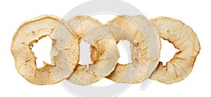 Dried apple chips cut out on a white. Top view