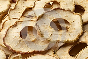 Dried apple chips full frame close up
