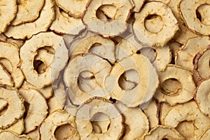 Dried apple chips full frame close up