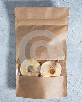 Dried apple in paper package