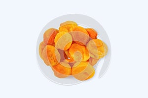 Dried apricots bunch on white background close-up