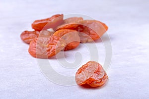 Dried apricots isolated white background. selective focus.