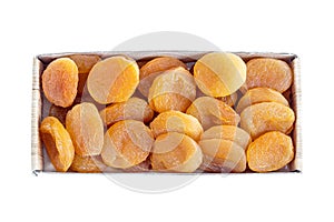 Dried apricots in a shopping package, isolated on white