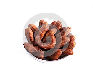 Dried bananas on the white cup
