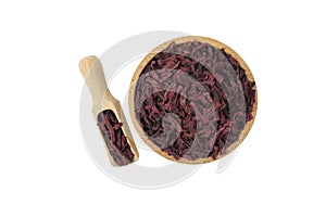 Dried beetroot slices in wooden bowl and scoop isolated on white background. food ingredient