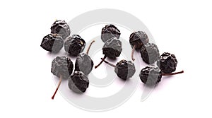 Dried berries of wild cherry on a white background