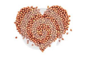 Dried black chickpeas in a heart shape