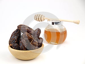 Dried black dates with honey