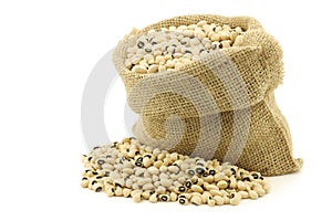 Dried black eyed peas in a burlap bag