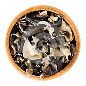 Dried black fungus Jew`s ear in wooden bowl