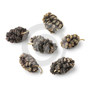 Dried black mulberries close up