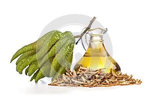 Dried buddha`s hand or citrus medica var. sarcodactylis peels ,fresh fruit and oil isolated on white background