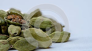 Dried cardamom seeds isolated on white