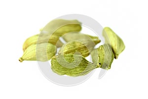 Dried cardamom seeds isolated on white background