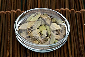 Dried cardamon in a bowl