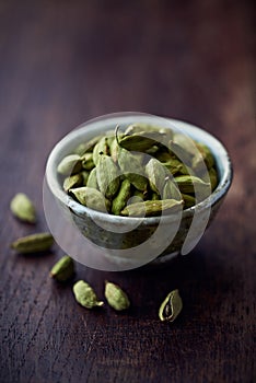 Dried cardamon pods in a dish