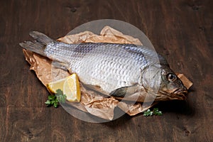 Dried carp with lemon and greens