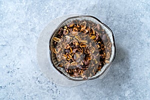 Dried Cascara Coffee Cherry Pulp and Outer Skin in Bowl photo