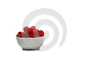 Dried cherries in a white bowl isolated on white background
