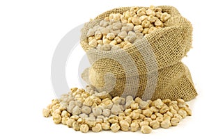 Dried chick peas in a burlap bag