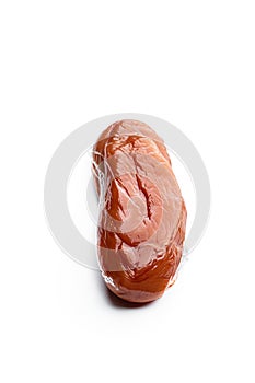 Dried chicken breast in vacuum pack isolated on white