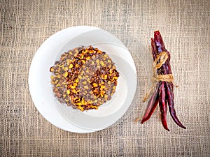 Dried chillies is ingredient of food are placed on the table.