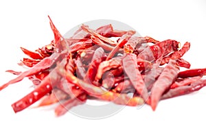 Dried chillies on white ground