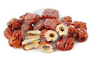 Dried chinese jujubes fruits on white