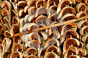 Dried citrus fruits on skewers photo