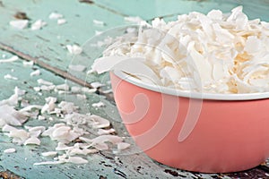 Dried coconut in a pink bowl