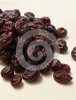 Dried dates on a white background