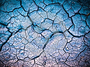 dried dehydrated cracked soil top view