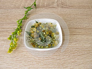 Dried european goldenrod in bowl