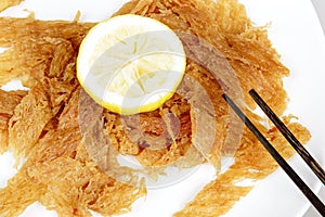 Dried fish decorated with lemon