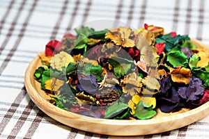 Dried flower with aroma in wood plate